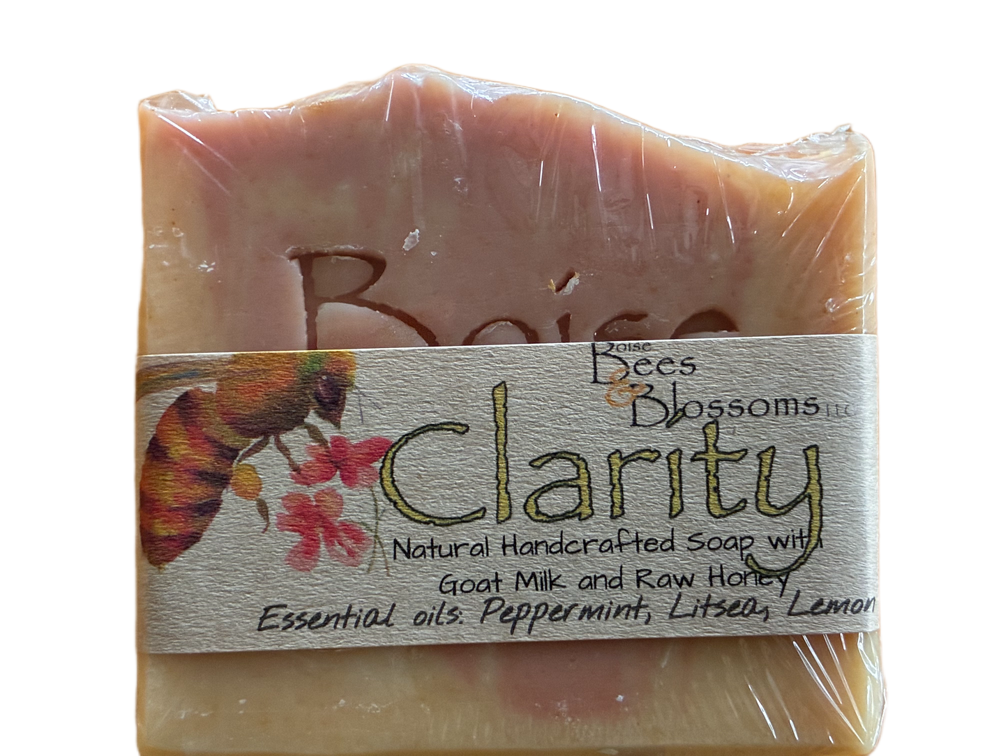 Clarity ar of soap with a clear wrapper and 'Bees Blossoms' label on a white background